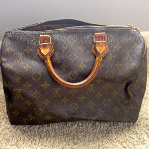 Louis Vuitton Speedy style bag. Needs some restoration but can still last